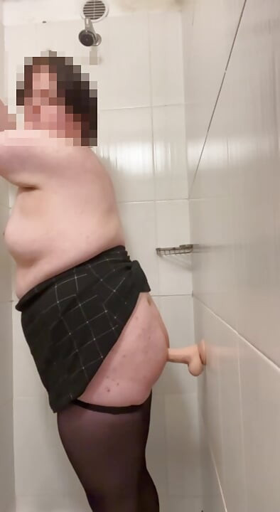 chubby fem boi crossdresser playing with dildo in shower