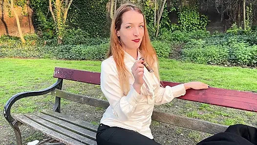 Liz Rainbow Smoking a Flor De Oliva Cigar Outdoors