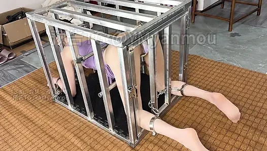 Iron Cages Hang From the Popcorn Shell