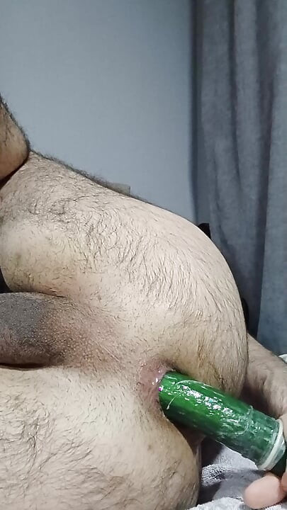 Hairy Turkish boy satisfies his hole with cucumber