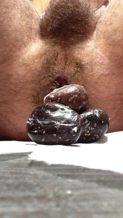 Anal insertion hole stretching stones pebbles