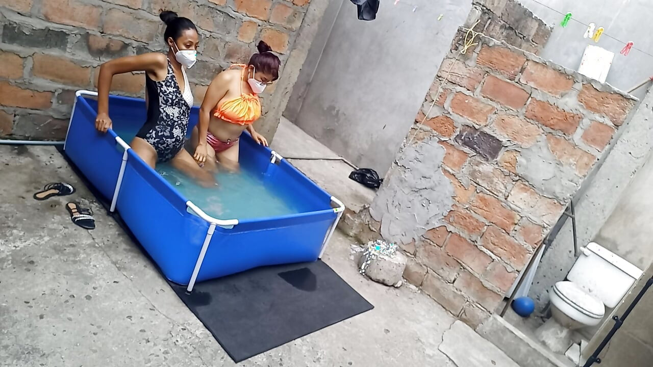 My neighbor is in the pool wearing a very tempting and sexy bikini. She's hot.
