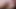 Teen brunette ladyboy in peach dress strokes her hairy cock