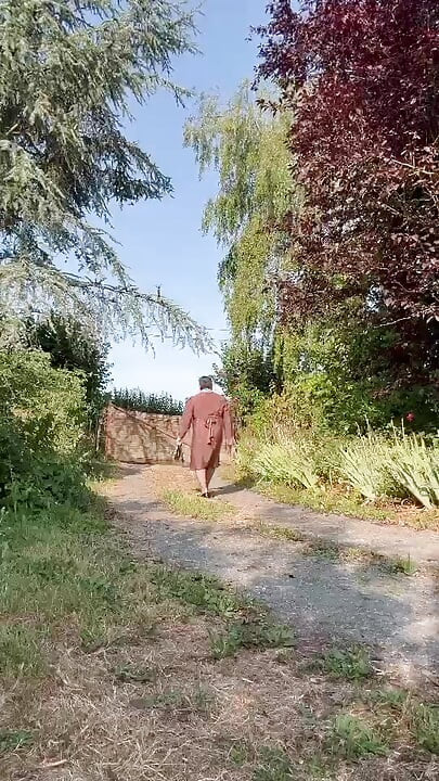 Wearing a brown Portefeuille-style dress for an evening
