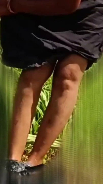 The desi stepsister of the village is bathing openly in the open field, bathing naked in the forest, brother-in-law is secretly watching the beautiful Bhabh. | Clip 1