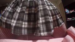sneak peak under a girls Mini skirt