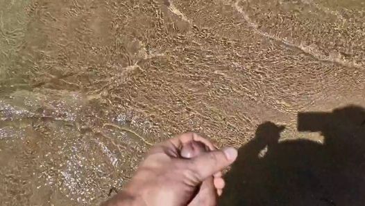 Dickflash on a nudist beach I approach a stranger and she is masturbating, touching my dick
