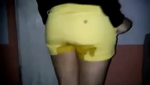 Latina in Yellow Shorts