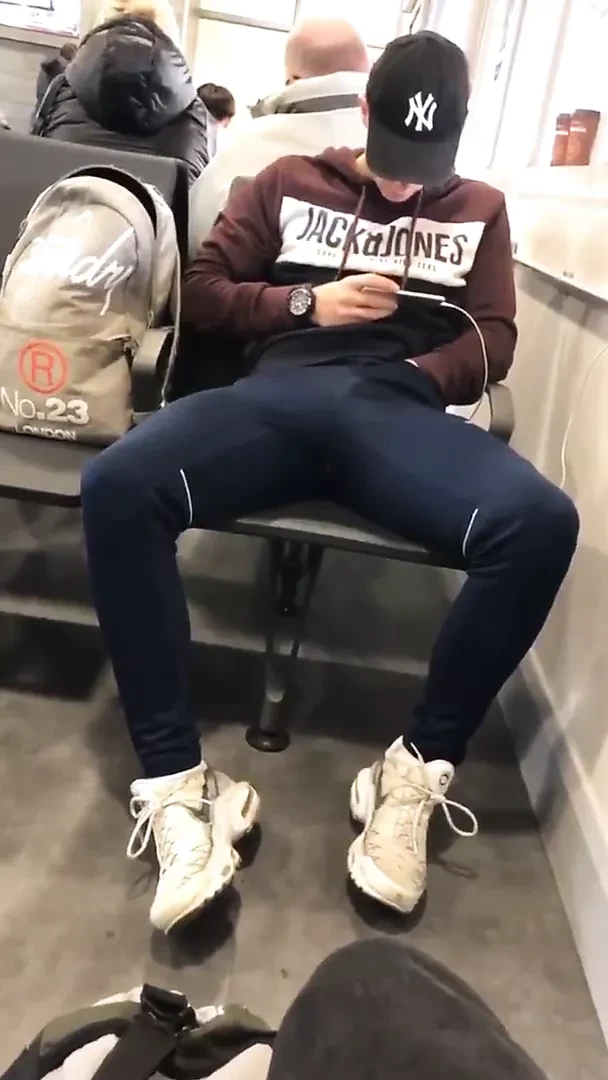 horny Twink rubs his bulge in public