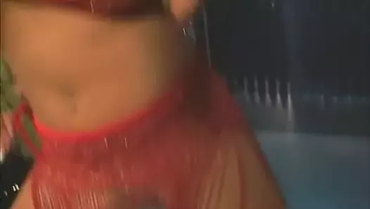 Gorgeous busty beauty rides sex machine at the strip club