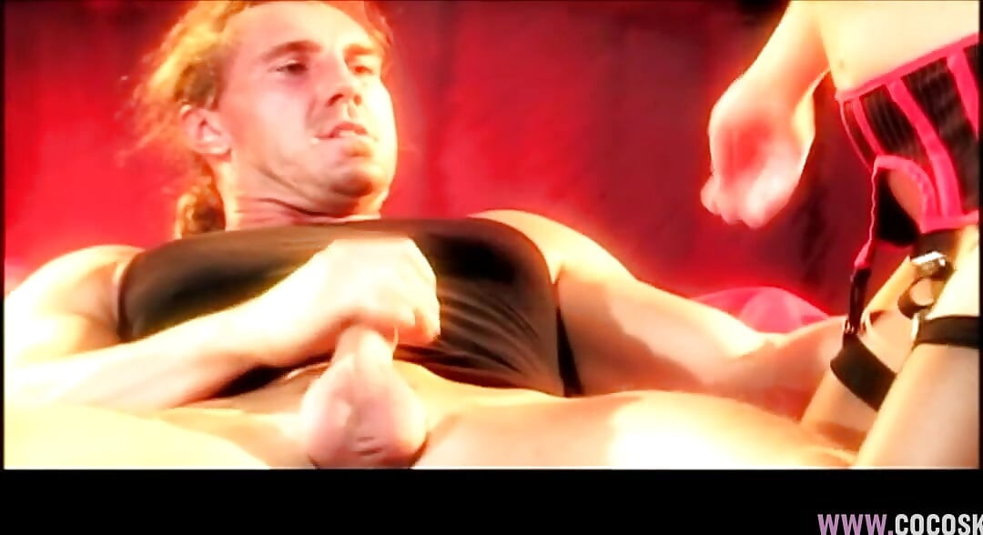 Blonde in Black Lingerie Rides Muscular Man on Red Bed