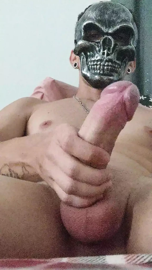 Masked man watching porn jerking off solo on Halloween