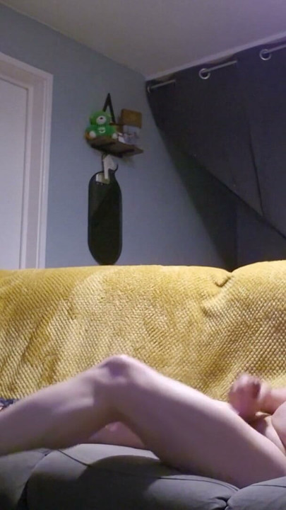 crossdresser layed on sofa playing with her self wearing nothing but her kitten heels and bra | Clip 1