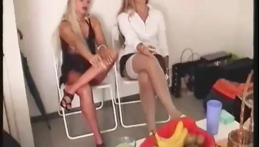 Making her slave get naked and lick feet of hers and her friend's
