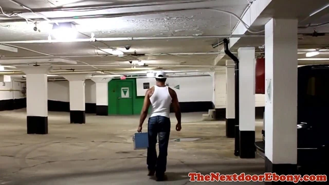 Ripped black mechanic jerking on his break