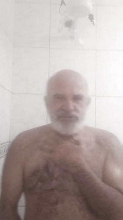 HAIRY BRUTE TAKING A SHOWER