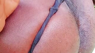 Horny African bottom asshole fingering outdoors