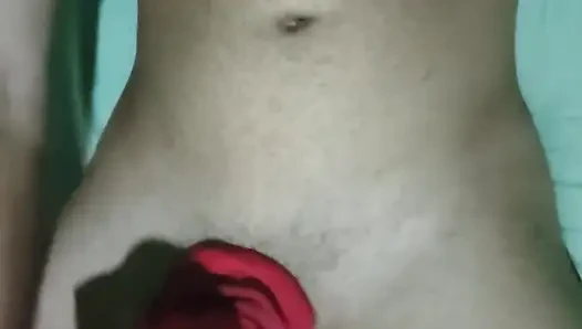 Young man keeps jerking off his big thick cock taking off his red underwear and getting naked lying on the bed