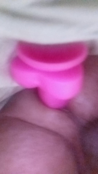 Me enjoying myself with a pink dildo by myself