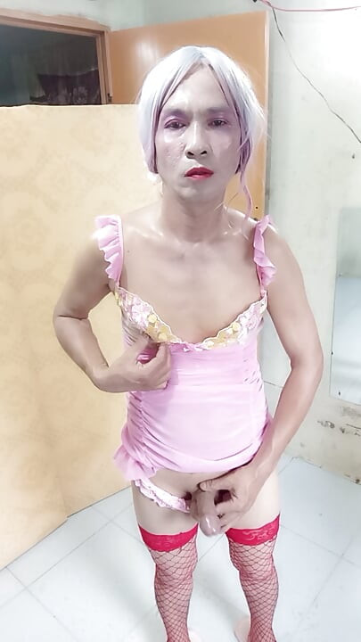 Oanh Le transgender wearing sexy and pornographic clothes standing and screaming is extremely happy