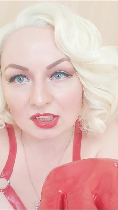 Emotional moment from "Strap-on POV video: topless Mistress in thigh high over knee boots with long gloves - Arya Grander"