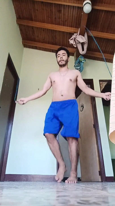 Guy Working Out Bouncing His Cock Between His Shorts Ends up Naked Working Out
