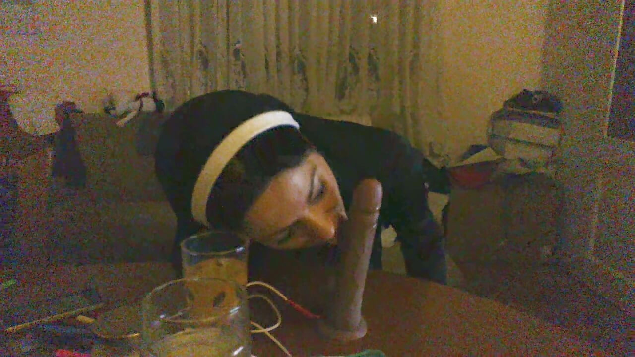 Mature slut  sucking big dildo
