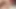 Vollbusige MILF-Rothaarige berührt ihre haarige Muschi