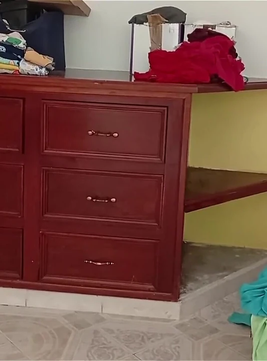 Chubby Girl Tidying the Room and Folding Clothes
