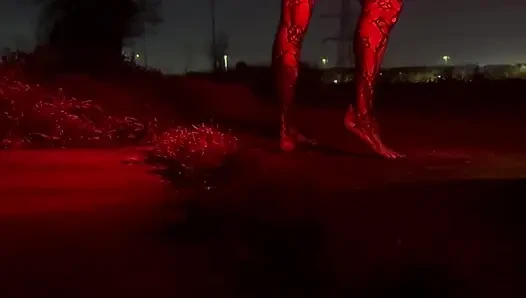 Wanking side of road In body stocking. Cars passing