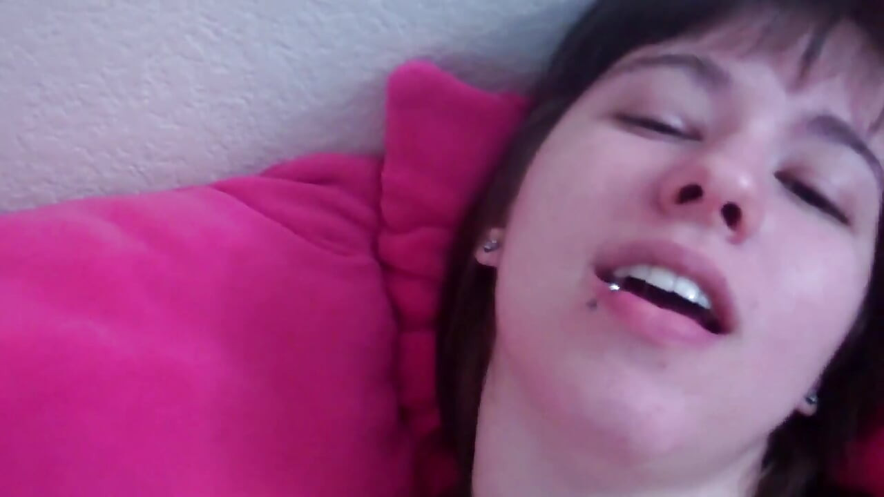 Tattooed teen masturbates with vibrator in close up scene