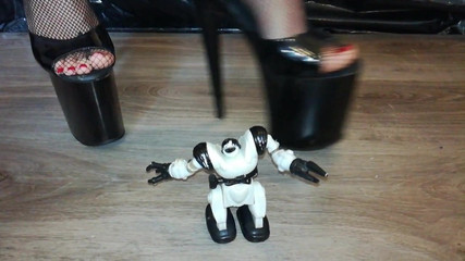 Lady L crush robot with sexy extreme high heels .