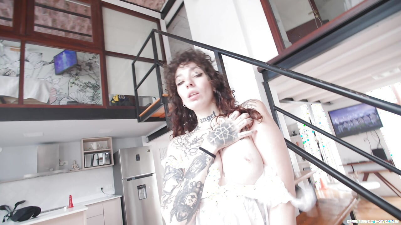 Tattooed Doing Striptease