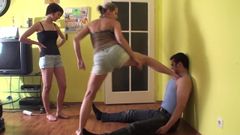Dominant Girls choking slaves with feet