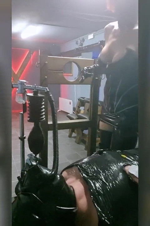 The Slave Suffers with a Breathing Mask During Hard Dilation.