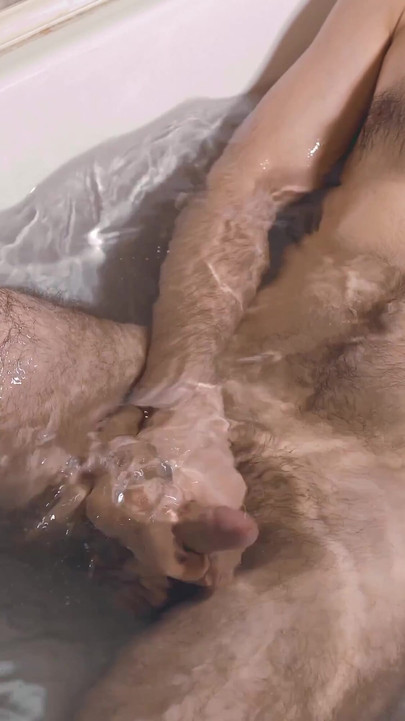 Memorable moment from "A young guy jerks off in the bath and if he holds back his moans during orgasm."