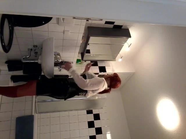 Lipstick finish of leather tranny in bathroom