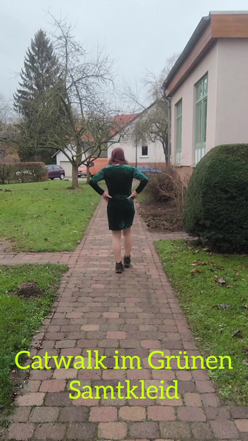 Catwalk in a green velvet dress.