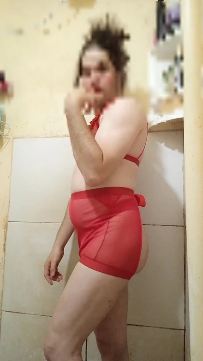 Captivating moment from "Boy wearing sexy red women's lingerie"