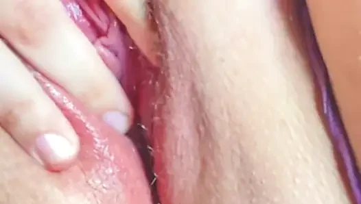 Close-up Latina in violet lingerie touching non-stop