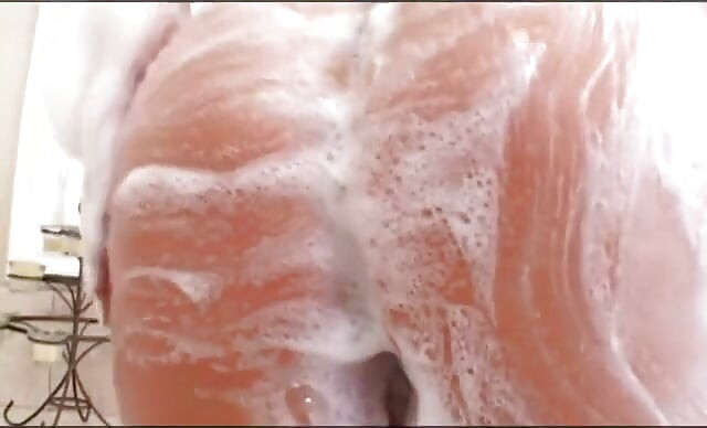 Busty whore gets fucked hard by studs and eats cum off a plate