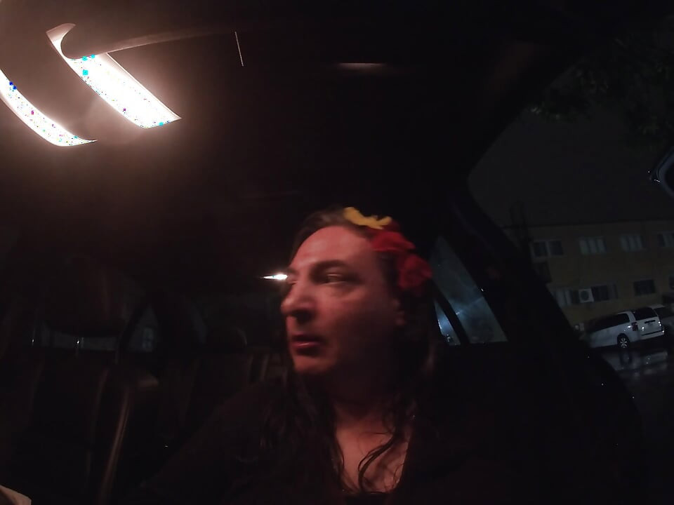Mature sissy CD out in the rain in A parking lot in public masturbation.