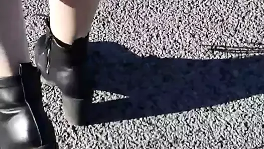 Girl Walking in pantyhose ans boots