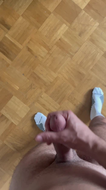 athletic German guy plays with his dick
