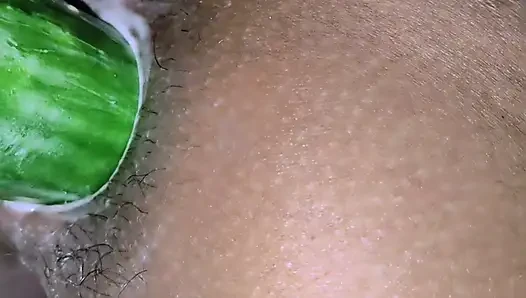 Pooja put his hand in his wife's pussy and inserted cucumber hot.