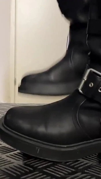 Stunning moment from "Your Balls and Cock Smashed by Your Biker Girl Friend in Dirty Boots"