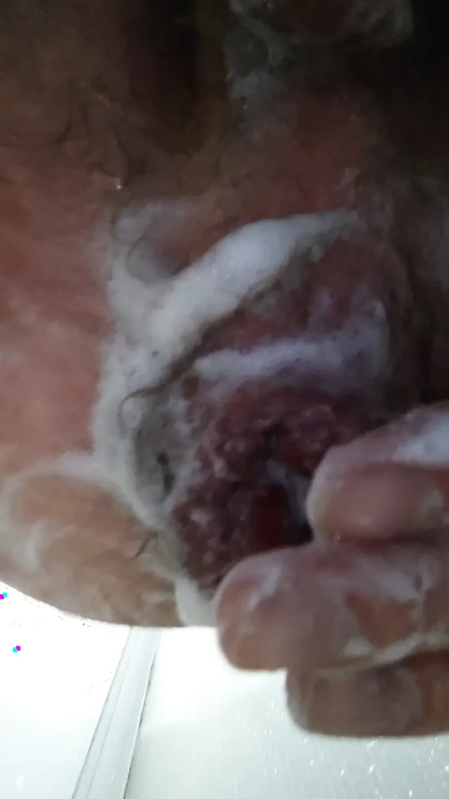 Anal fisting in the shower