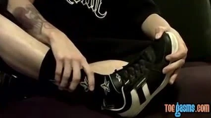 Young man enjoys some freaky feet play while he is alone