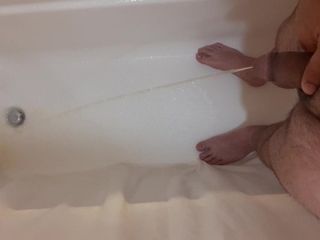 Small dick pissing in shower with farting