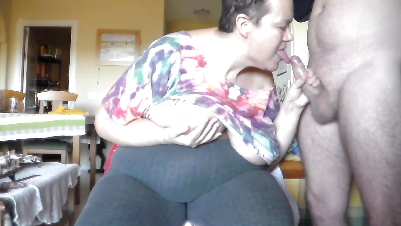 Jen is rubbing her boobs and sucking John's cock